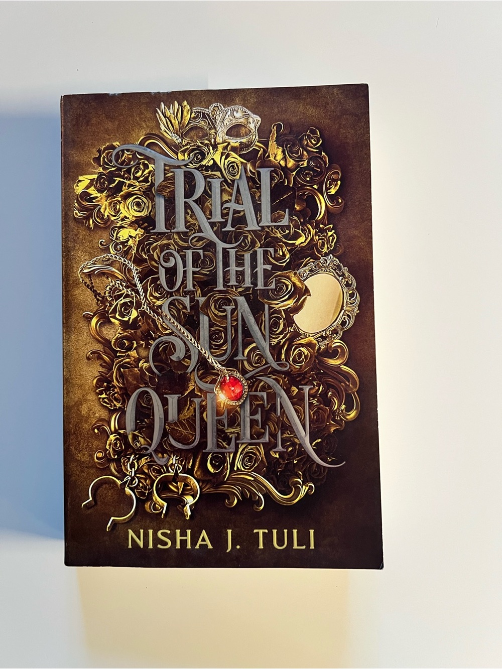 Trial of the Sun Queen by Nisha J. Tuli - Gold and Brown Cover